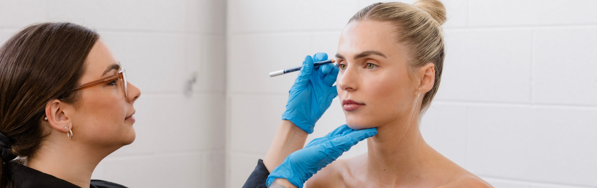Nurse injecting patient with botox