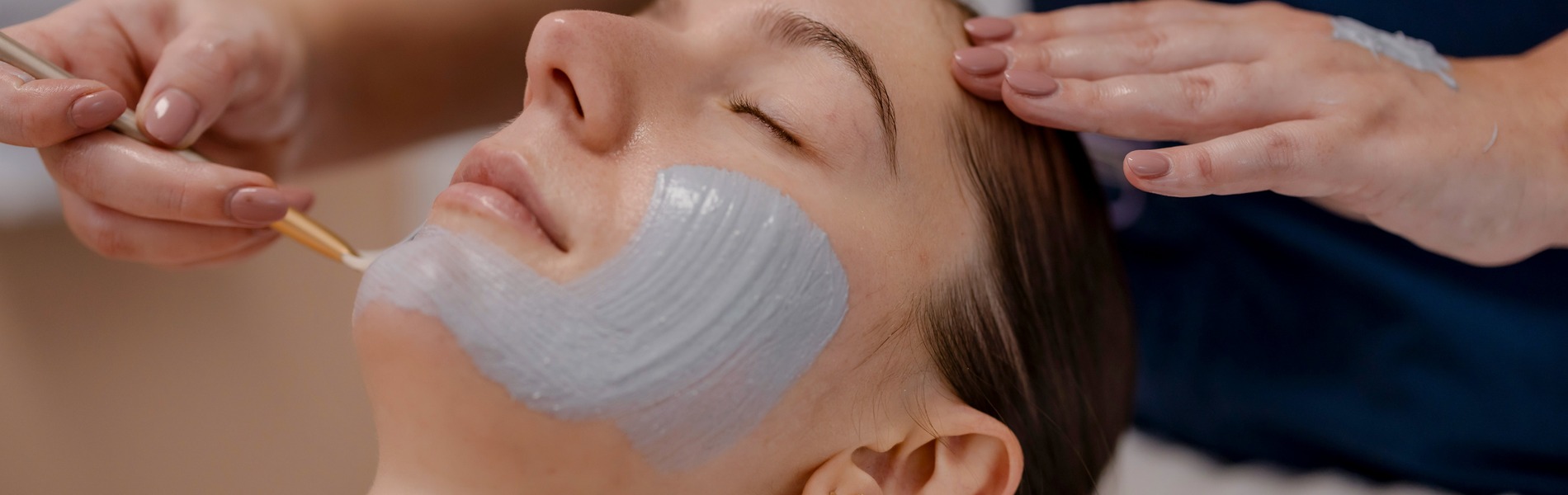 blue face mask on a ladies face